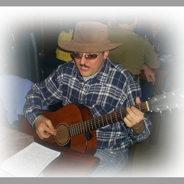 Zpívající kytarista hledá další hráče styl country a folk.